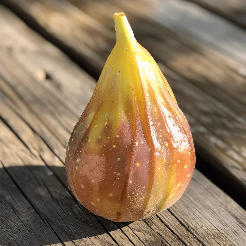 Ripe Desert King fig on a wooden surface